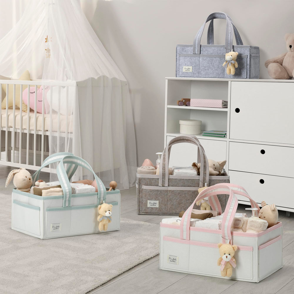 Neutral design suits both newborn girl and boy nurseries.