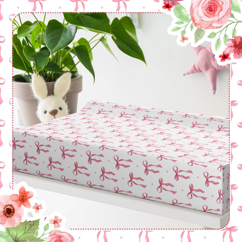 Peryiter pink bow and stripe styles enhance nursery ambiance