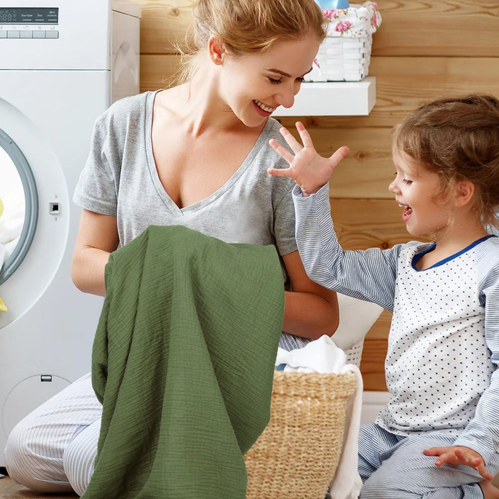 Pet Rejoir machine-washable bassinet sheets for simple care routine.