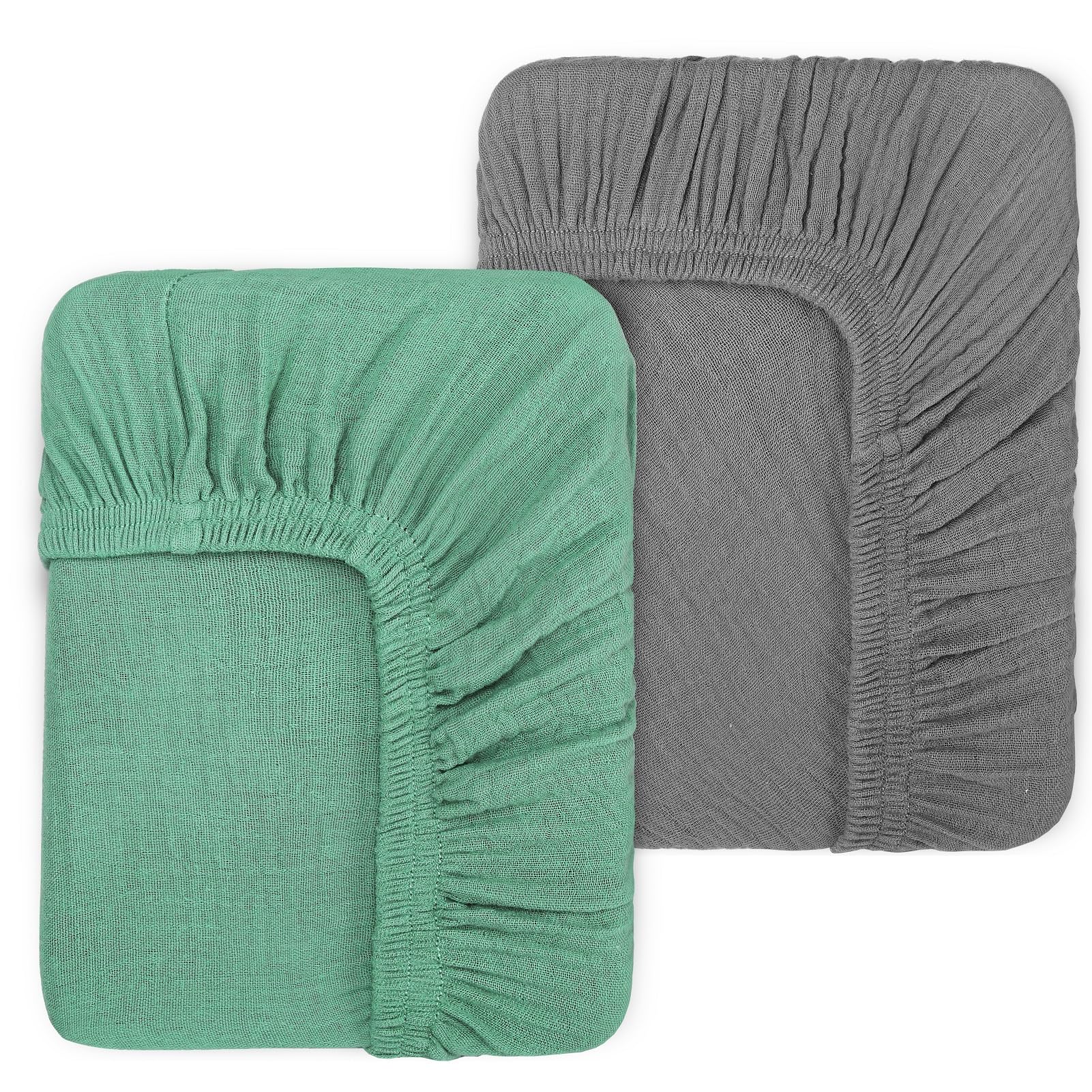 Pet Rejoir muslin fitted crib sheet in green for a cozy sleep surface