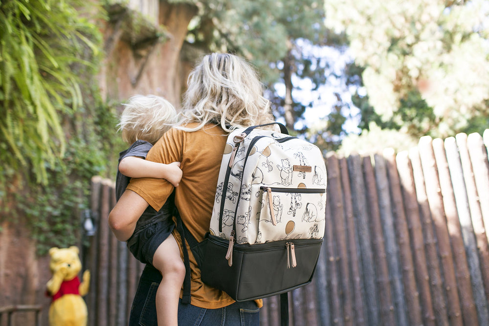 Petunia Pickle Bottom District Backpack Winnie the Pooh removable changing pad included for on the go changes.