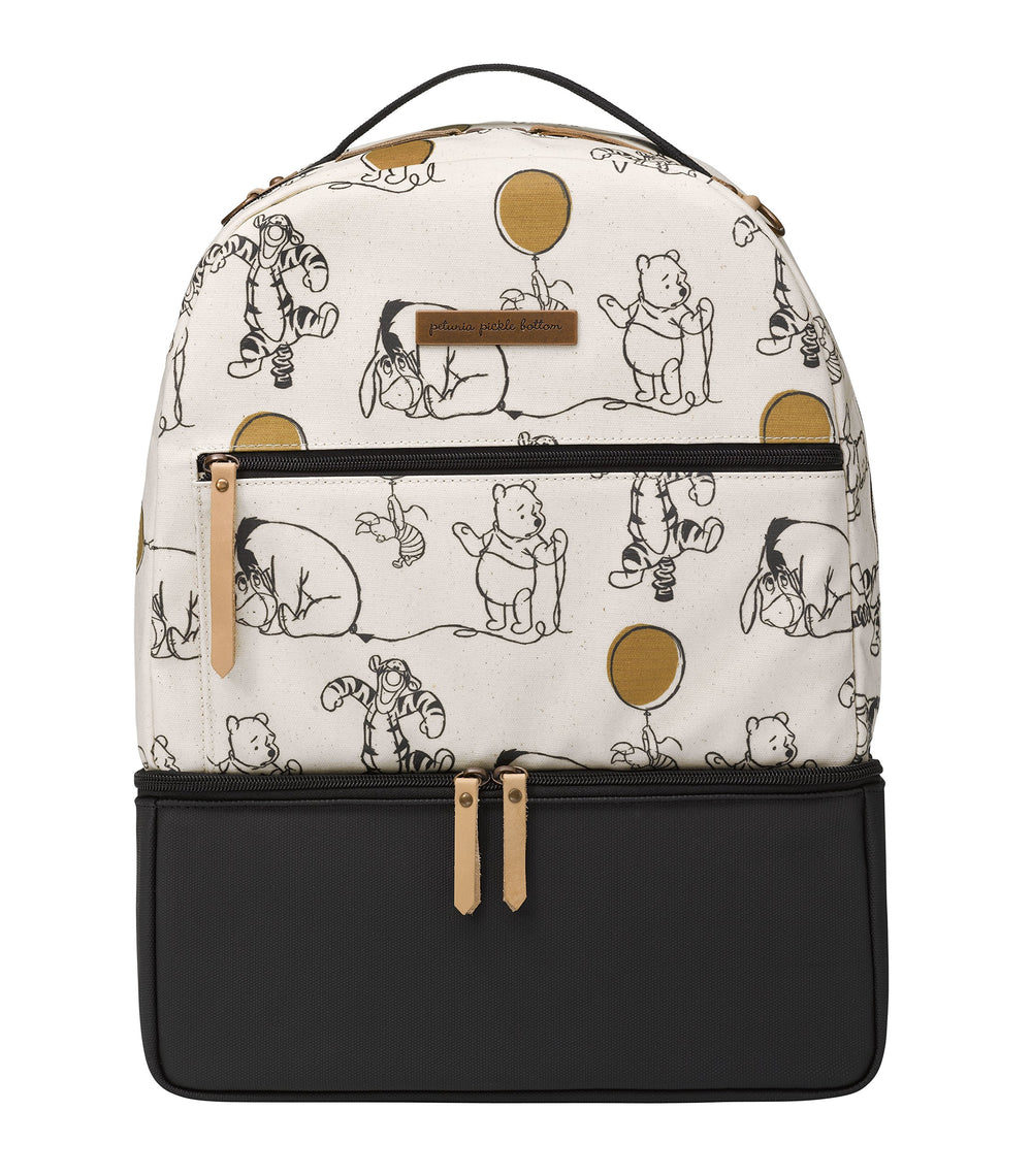 Petunia Pickle Bottom District Backpack Winnie the Pooh front view with organized pockets for quick access.