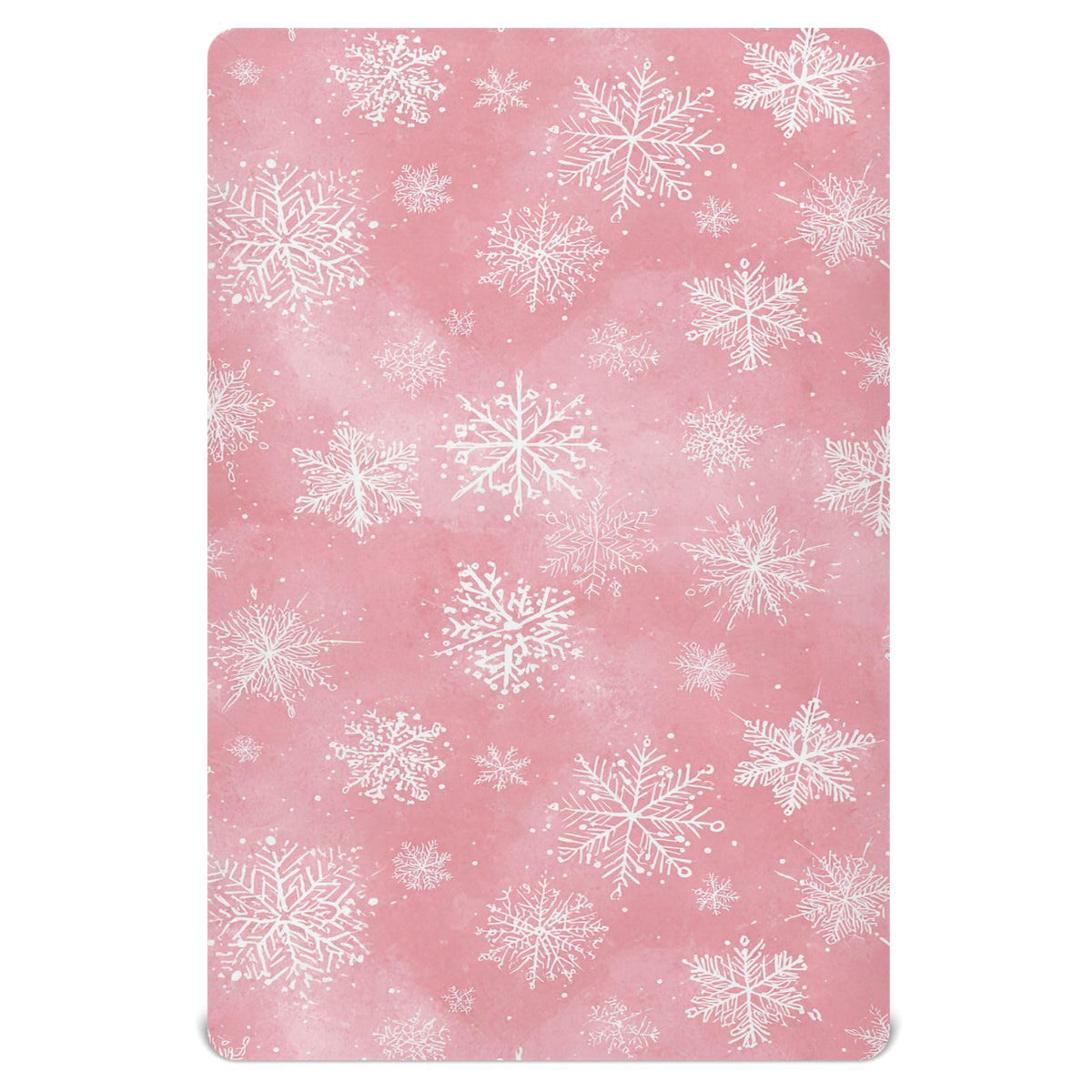 Pfrewn Christmas crib sheet with pink retro snowflakes on a mini crib for cozy naps