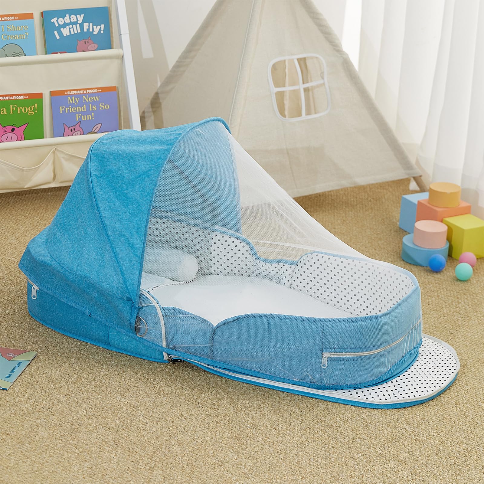 PGONEEE blue bassinet folds into a lightweight backpack for trips.