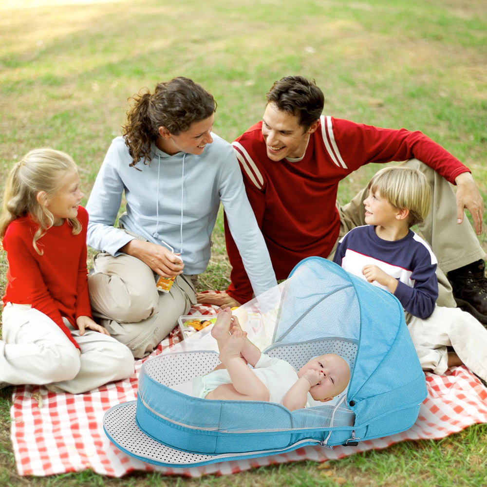 PGONEEE blue bassinet features soft pad for cozy rests.