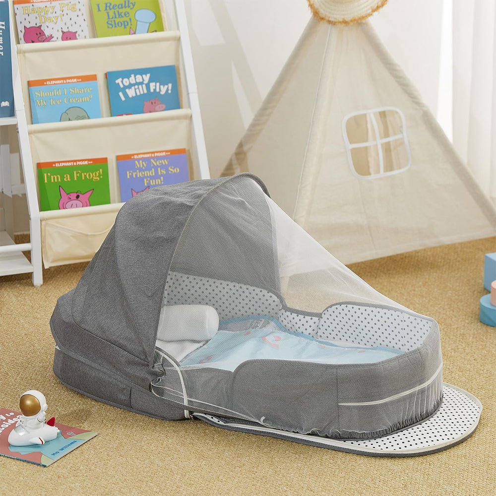 PGONEEE baby travel bassinet open with baby resting in travel-ready space.