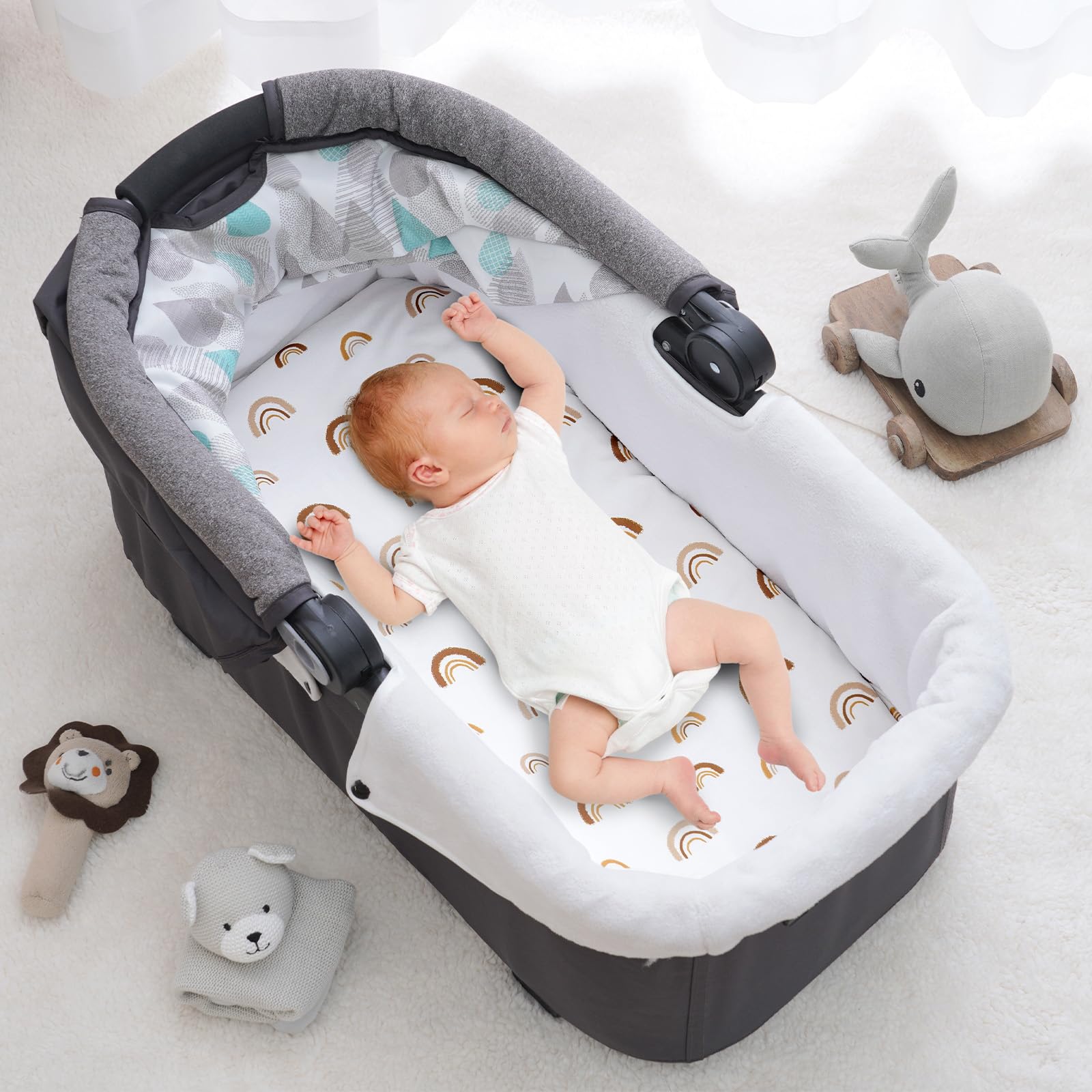 PHF rainbow bassinet sheets close-up shows soft touch fabric for baby skin.