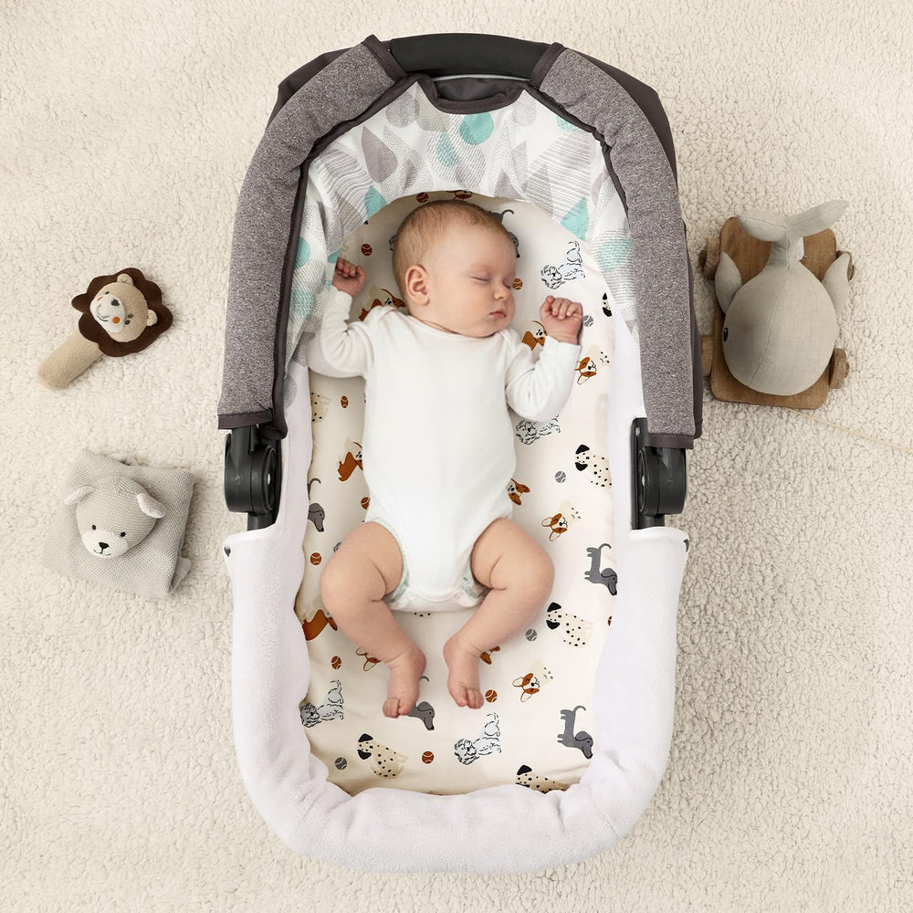 PHF bassinet sheets universal fit demonstrates secure bottom elastic for snug placement.