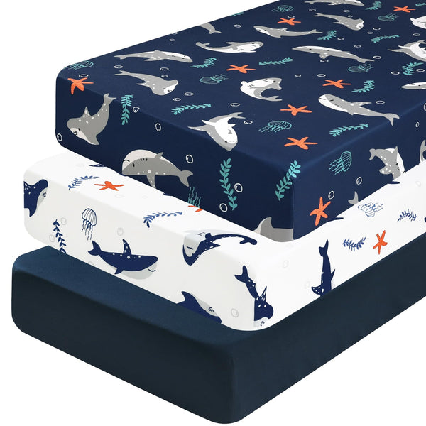 PHF shark crib sheet showing a snug 28x52 fit for standard cribs.