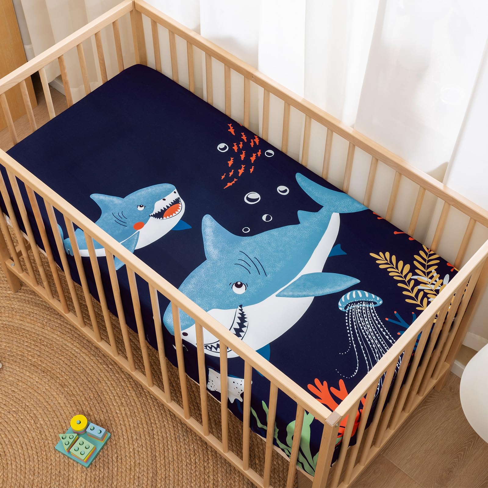 PHF shark crib sheet durable-edges ensure long-lasting use through washes.