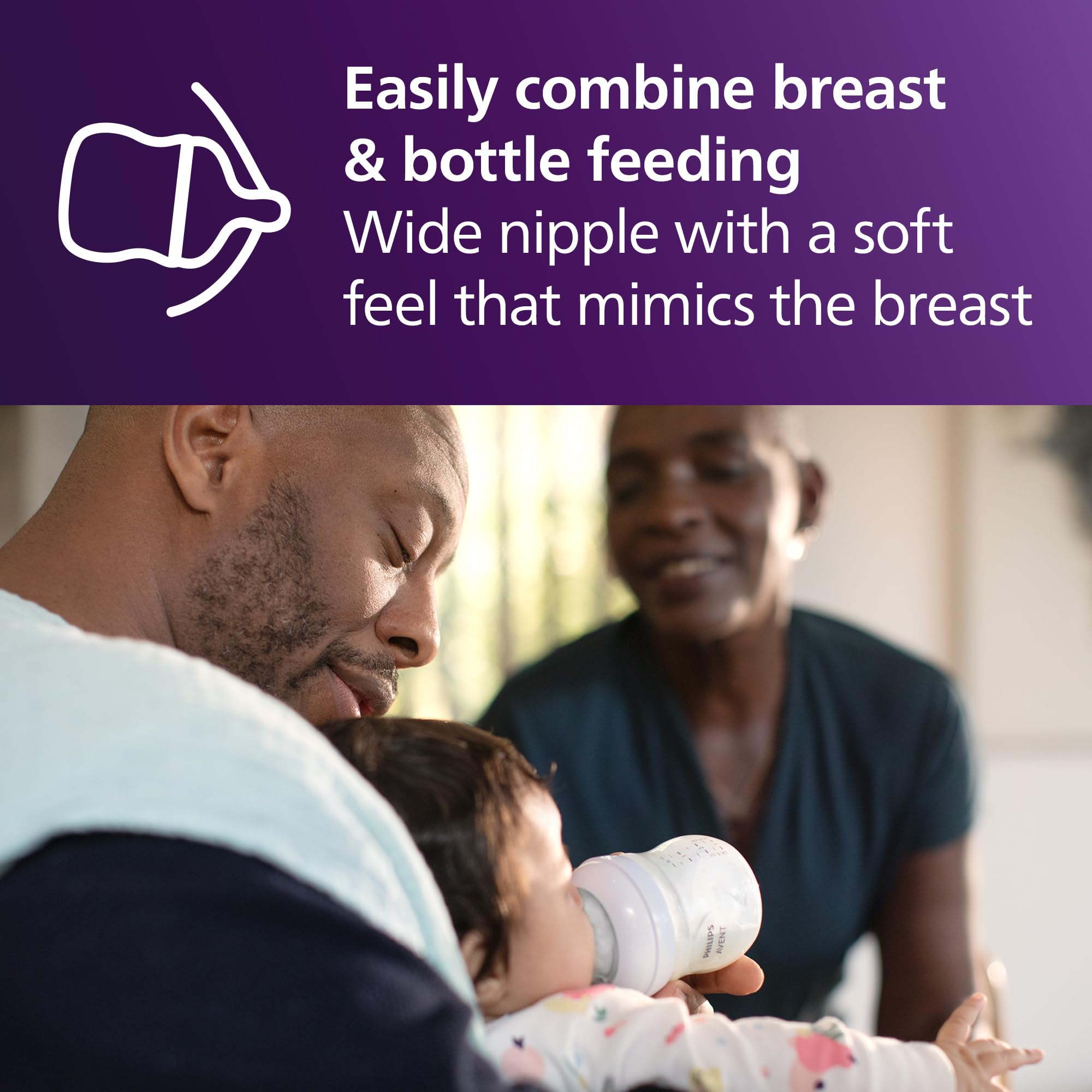 Baby holding Philips Avent bottle with ergonomic shape for easy grip