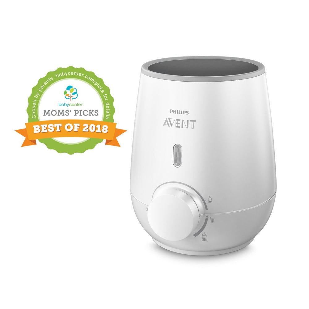 Philips Avent bottle warmer neon glow indicates active operation.