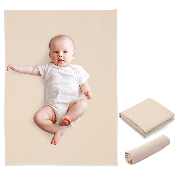 PHOEBUS BABY apricot vegan leather changing mat on a dresser, wipe-clean surface.