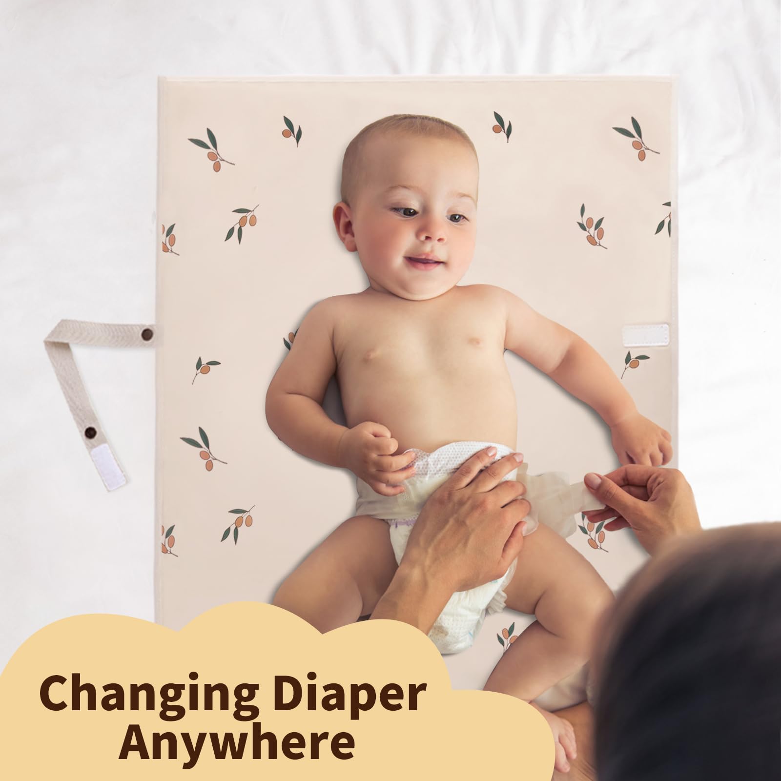 PHOEBUS BABY changing pad used on bed or sofa for versatile home setup.