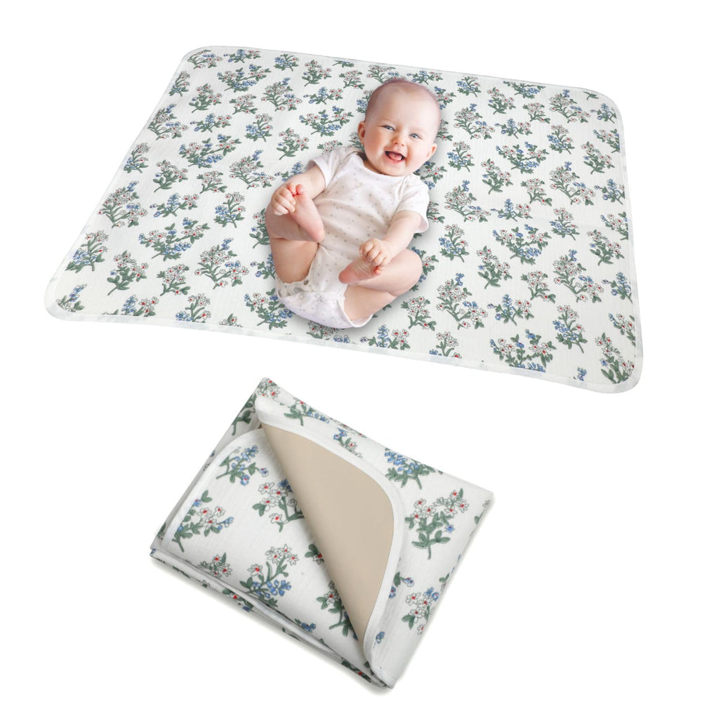 PHOEBUS BABY changing pad front muslin side for soft, breathable skin contact.