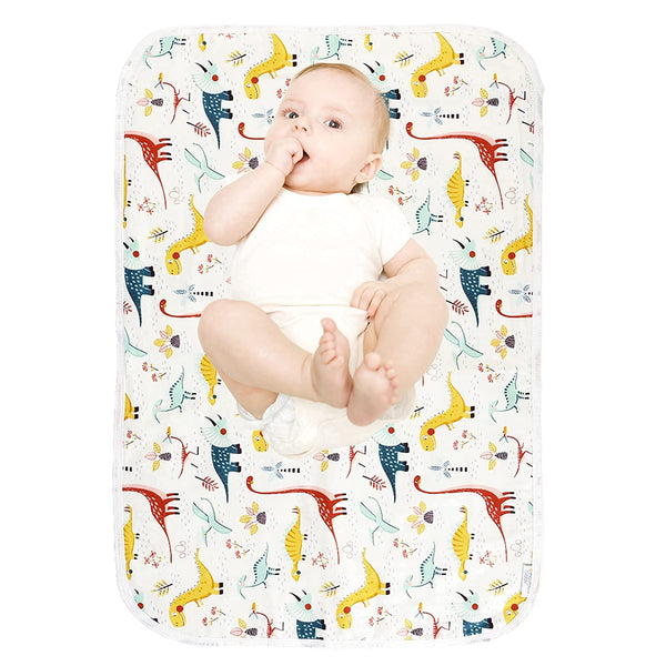 PHOEBUS BABY dinosaur changing pad, large surface for easy diaper changes.