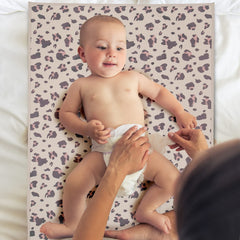 Phoebus Baby foldable travel changing mat in leopard design, fits in bags.