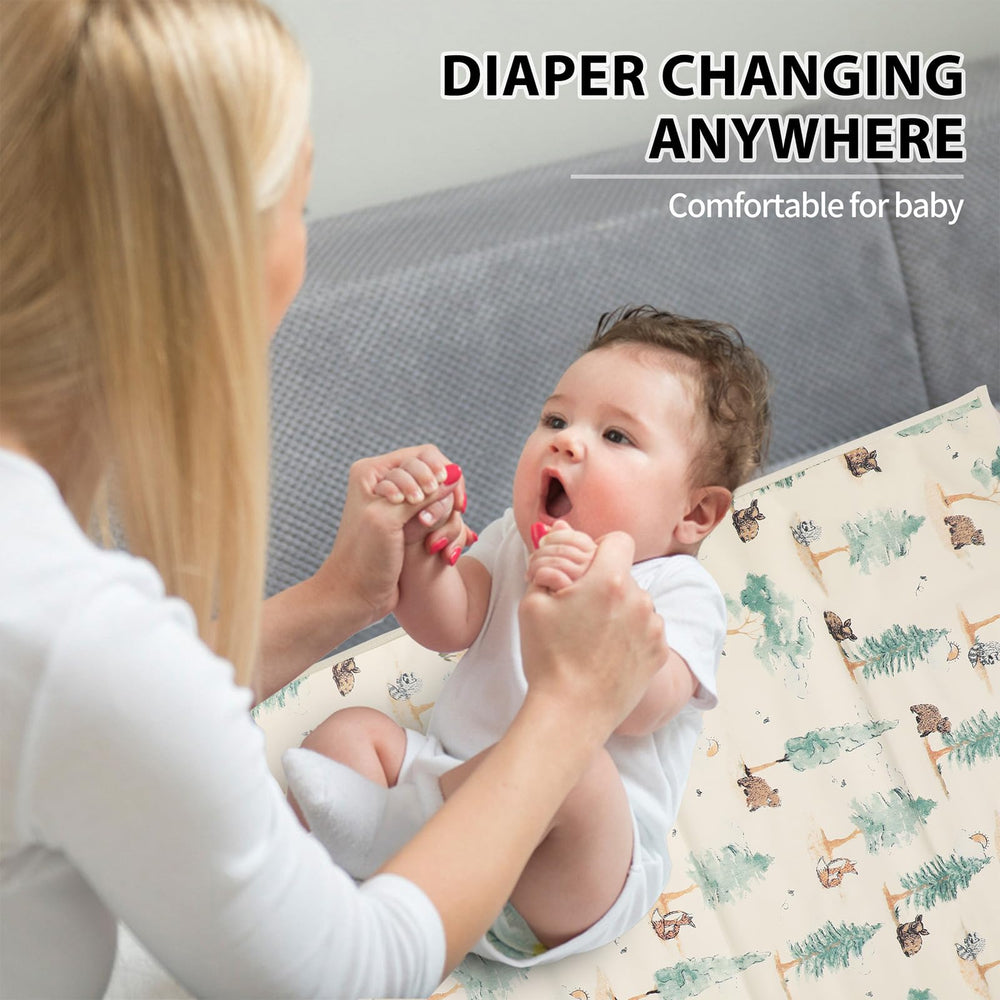 PHOEBUS BABY forest changing mat gift-ready packaging for new parents.
