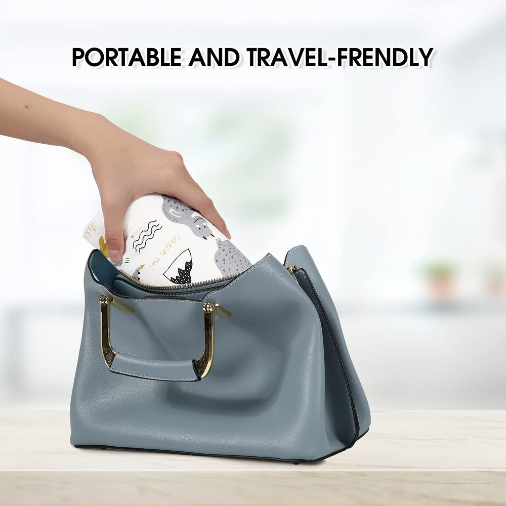 PHOEBUS BABY portable mat stored in diaper bag.