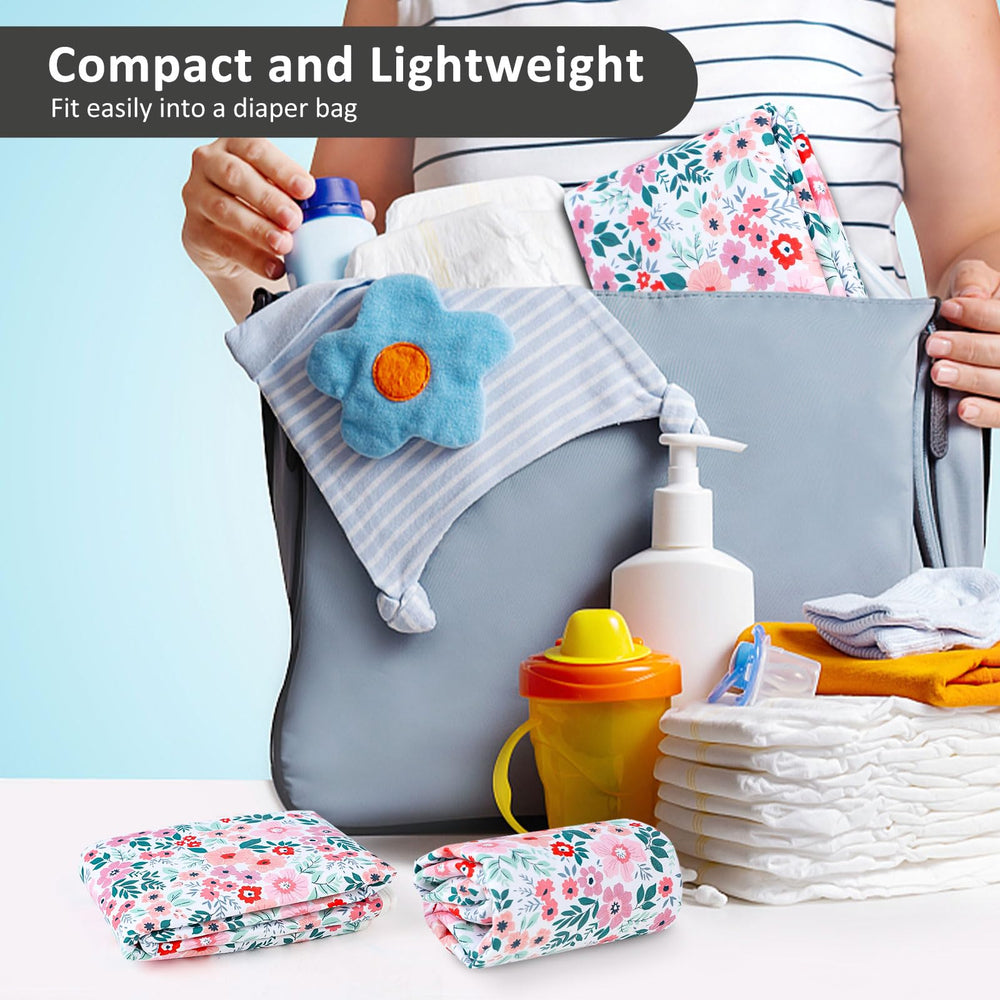 PHOEBUS BABY travel-friendly fold fits neatly in a diaper bag for on-the-go use.