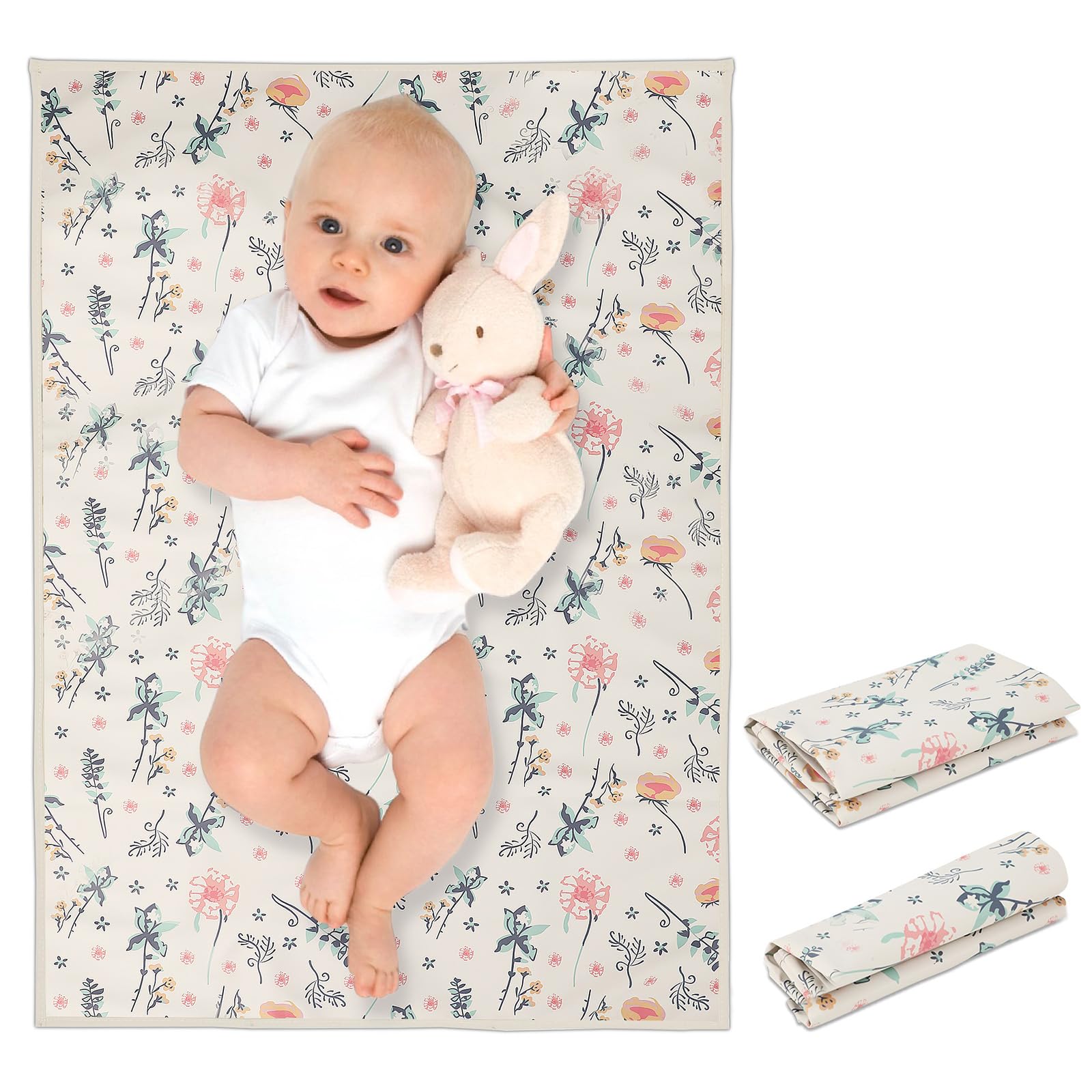 Phoebus Baby vegan leather changing mat, floral design, open for quick diaper changes.
