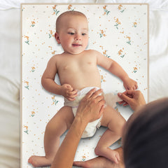 Wipe-clean surface of PHOEBUS BABY changing mat keeps messes simple to wipe away