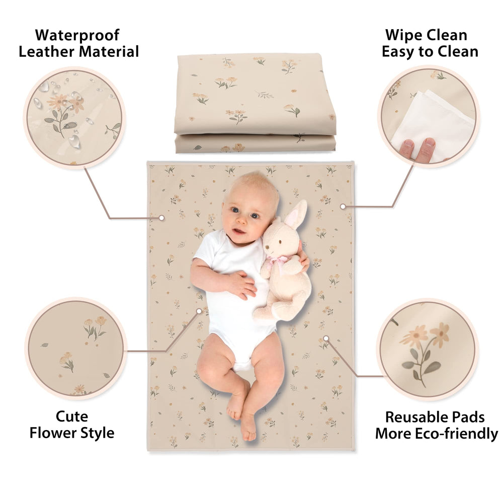 Phoebus Baby vegan leather changing mat wipeable surface for quick cleanup.