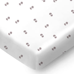 Pickle & Pumpkin mini crib sheet with geometric pattern, soft organic cotton for a cozy nursery.