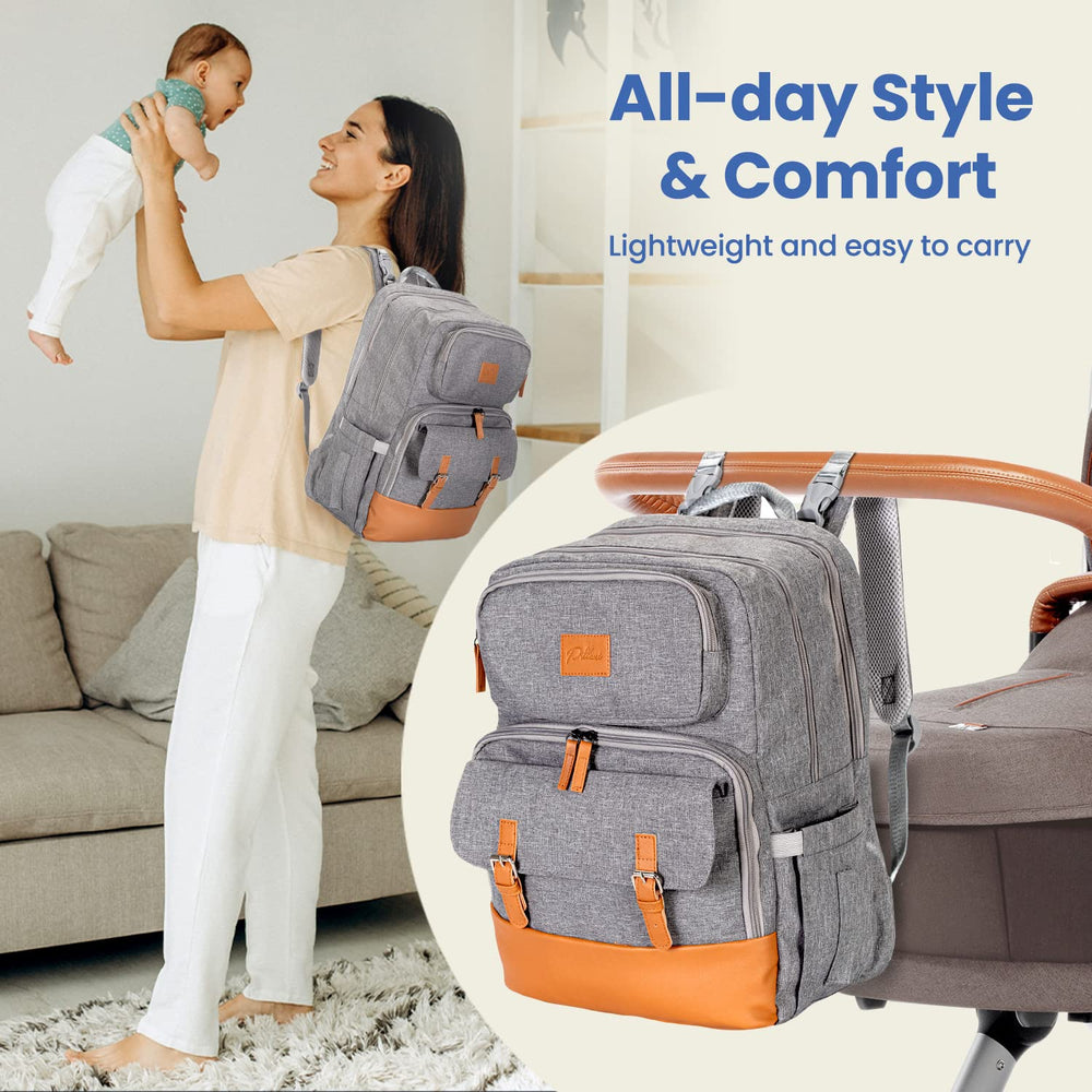 PILLANI waterproof Oxford diaper bag backpack withstands wet weather and daily use.