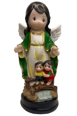 Pink Princess memory book and green angel candle provide a lasting keepsake for memories.