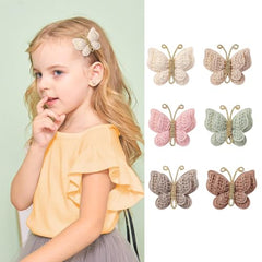 Pinkoriart butterfly clip close-up with non-slip grip, secure during active play.