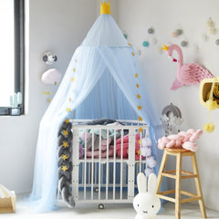 Pinkrin blue crib canopy with soft tulle creating a dreamy, airy space