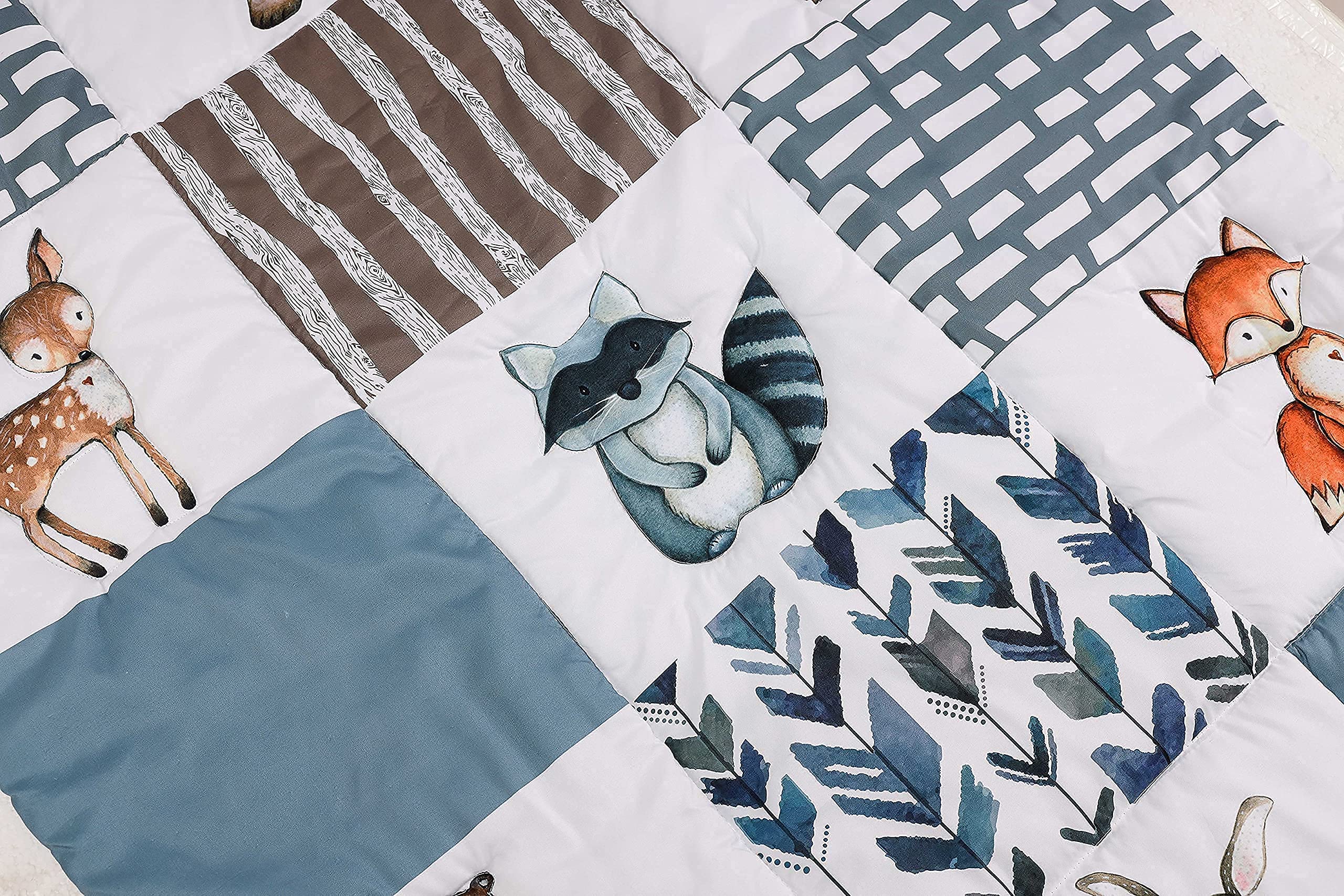 PINNKKU crib bedding on crib with 14-inch drop for a proper fit