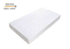 PINNKKU crib skirt with 15-inch drop neatly hides under-crib storage.