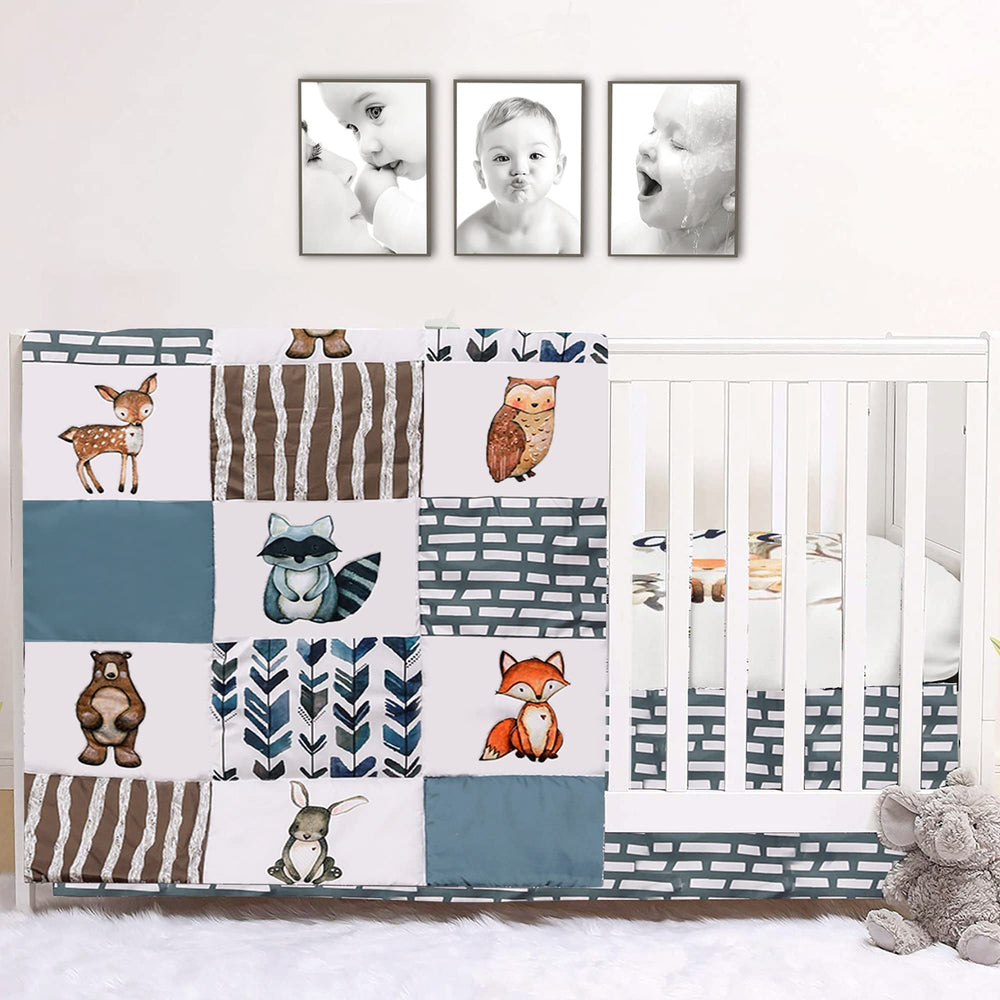 PINNKKU woodland-animals crib quilt on a standard crib for cozy nursery ambience