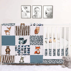 PINNKKU woodland-animals crib quilt on a standard crib for cozy nursery ambience