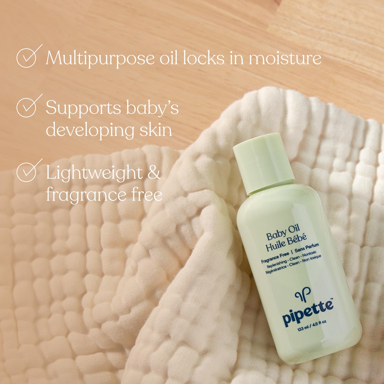 Pipette Baby Oil showcasing sugarcane-derived squalane for stable, lightweight hydration.