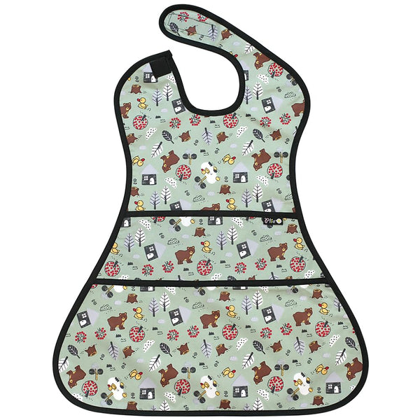 Plie full coverage bib with bear print worn by toddler during mealtime for mess protection.