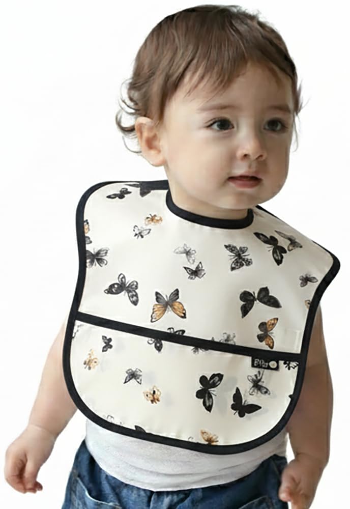 Plie Ivory Butterfly pocket detail highlights catch-all pocket to trap spills during meals