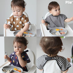 Plie bib featuring a name tag to prevent loss in daycare and outings.