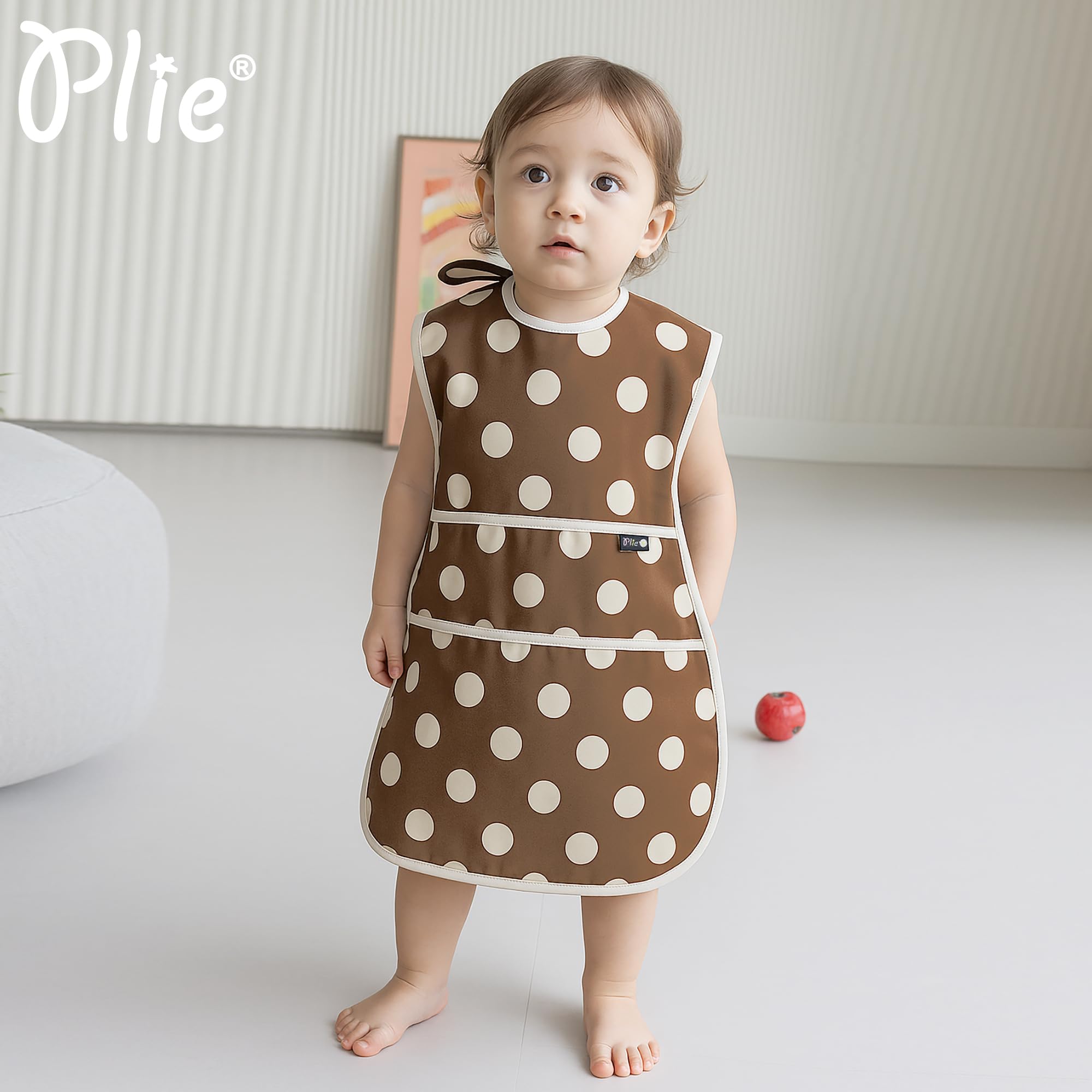 Plie extra-long apron bib offers full-body coverage for messier play.