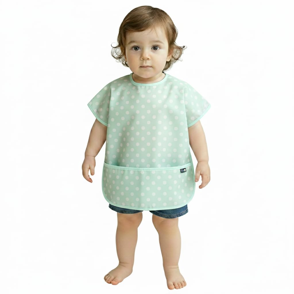 Plie short sleeve waterproof bib in baby blue dots protects clothing during meals.