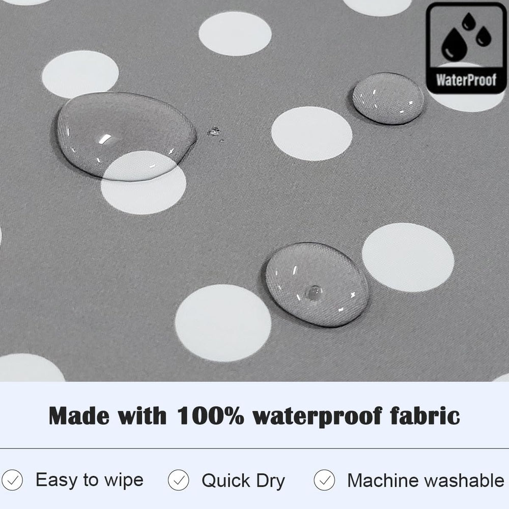 Plie gray dot bib wipe-clean fabric for quick cleanup after meals