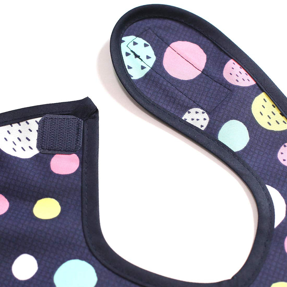 Plie waterproof bib side angle shows extra-long protection from spills.