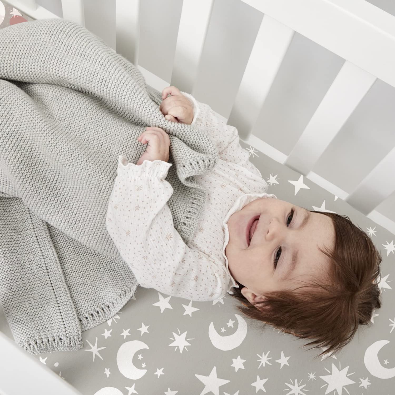 Plushii 52x28 fit ensures secure coverage on standard crib mattresses.