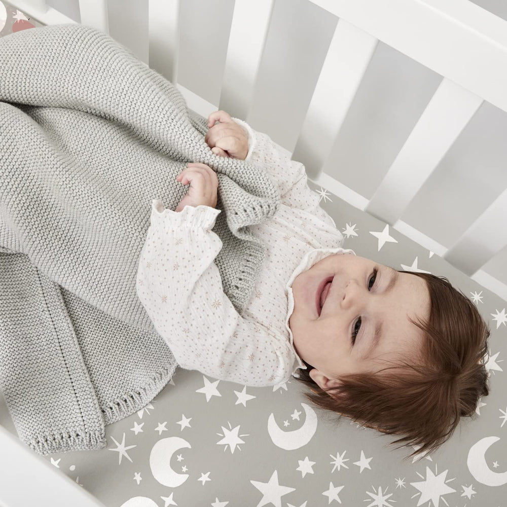 Plushii 52x28 fit ensures secure coverage on standard crib mattresses.