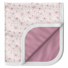 Pobibaby Blossom blanket texture close-up shows soft, stretchy knit for cozy swaddling.