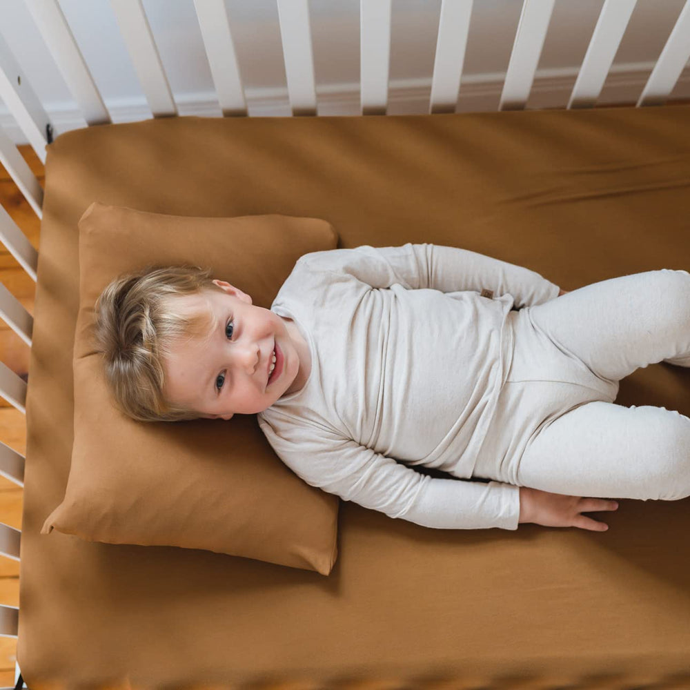 Pobibaby coordinating crib bedding palette for a cohesive nursery look.