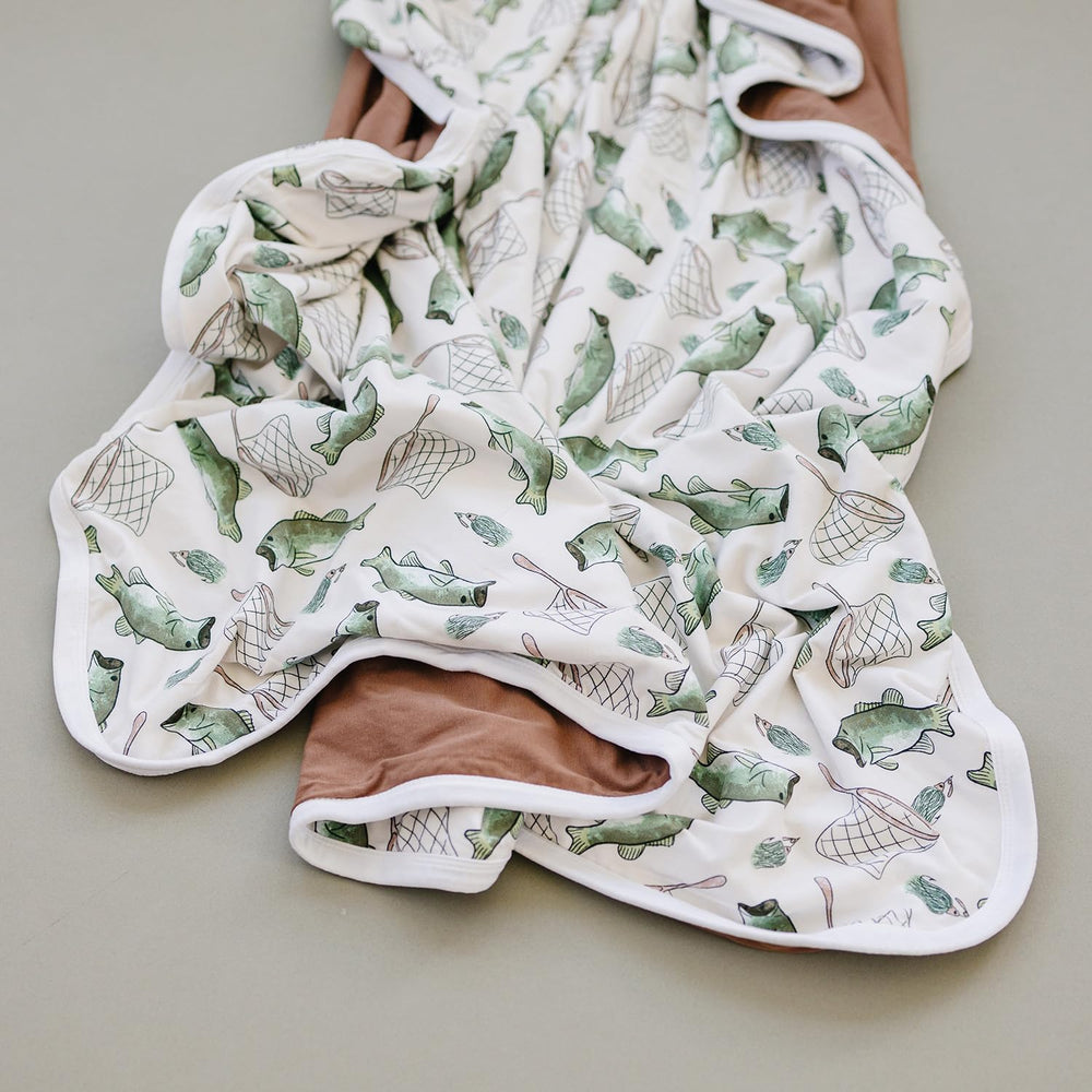Pobibaby Gone Fishing cotton-spandex blend for gentle stretch.