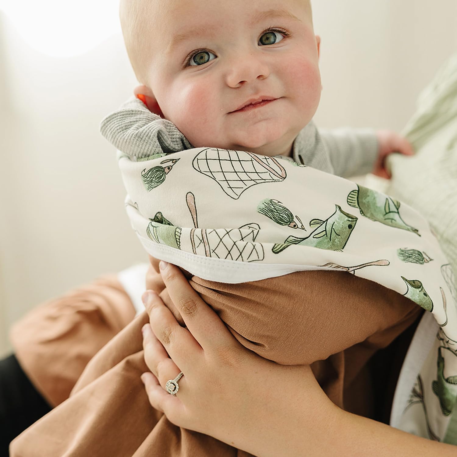 Pobibaby Gone Fishing jersey-knit texture detail.